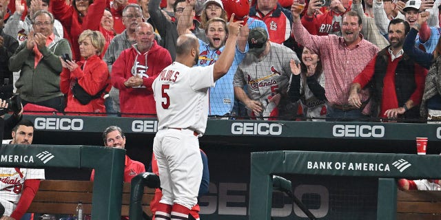 St. Louis Cardinals designated hitter Albert Pujols (5) gives the sold-out crowd a curtain call after hitting his 701st home run during a MLB game between the Pittsburgh Pirates and the St. Louis Cardinals, September 30, 2022, at Busch Stadium, St. Louis, MO. 