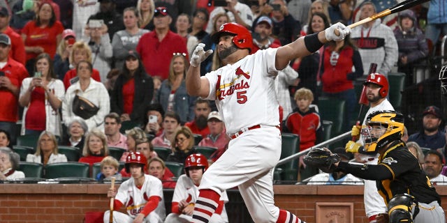 St. Louis Cardinals designated hitter Albert Pujols (5) hits his 701st home run in the fourth inning during a MLB game between the Pittsburgh Pirates and the St. Louis Cardinals, September 30, 2022, at Busch Stadium, St. Louis, MO. 