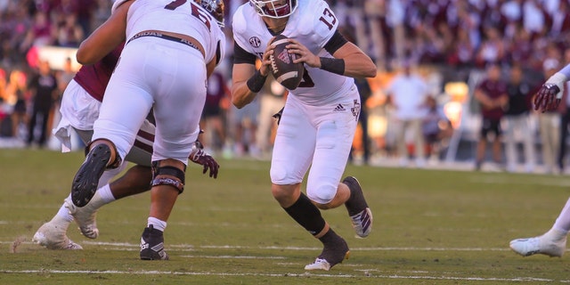 Texas A and M Aggies quarterback Haynes King (13) rolls out during a game against the Mississippi State Bulldogs Oct. 1, 2022, at Davis Wade Stadium in Starkville, Miss. 