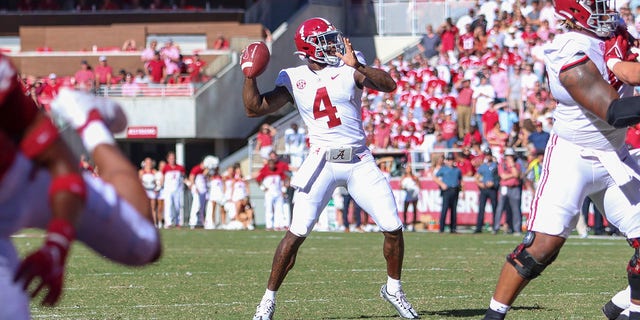 Alabama Crimson Tide quarterback Jalen Milroe, #4, with a pass attempt during the college football game between the Alabama Crimson Tide and Arkansas Razorbacks on Oct. 1, 2022 at Donald W. Reynolds Razorback Stadium in Fayetteville, Arkansas. 