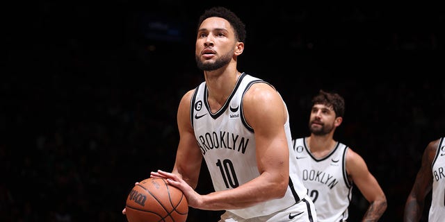 Ben Simmons (10) of the Brooklyn Nets prepares to shoot a free throw against the Philadelphia 76ers during a preseason game Oct. 3, 2022, at Barclays Center in Brooklyn, N.Y. 