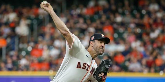 Houston Astros starting pitcher Justin Verlander, #35, throws a pitch in the top of the second inning  during the MLB game between the Philadelphia Phillies and Houston Astros on Oct. 4, 2022 at Minute Maid Park in Houston.