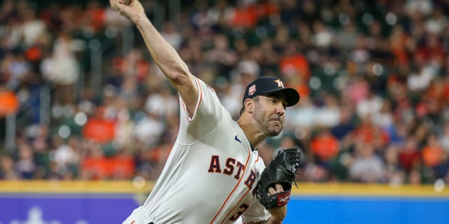 Houston Astros starting pitcher Justin Verlander, #35, throws a pitch in the top of the second inning during the MLB game between the Philadelphia Phillies and Houston Astros on Oct. 4, 2022 at Minute Maid Park in Houston.
