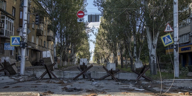 Anti-tank hedgehogs block the streets in downtown Bakhmut as fighting between Ukrainian forces and Russian troops intensifies for control of the city in Bakhmut, Ukraine on October 04, 2022. 