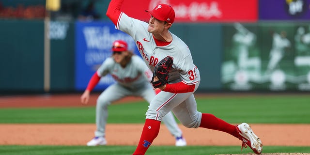 David Robertson, #30 of the Philadelphia Phillies, pitches in the eighth inning during the Wild Card Series game between the Philadelphia Phillies and the St. Louis Cardinals at Busch Stadium on Friday, Oct. 7, 2022 in St. Louis, Missouri. 