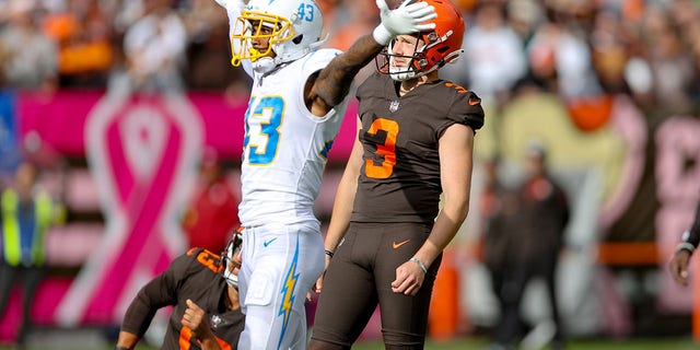 Los Angeles Chargers cornerback Michael Davis celebrates as Browns kicker Cade York misses a 54-yard field goal with 0:16 seconds left in the game on Oct. 9, 2022, at FirstEnergy Stadium in Cleveland.