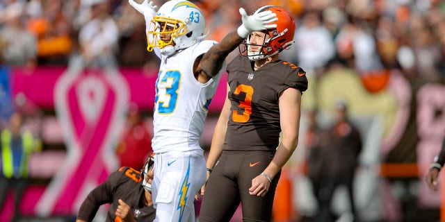 Los Angeles Chargers cornerback Michael Davis celebrates as Browns kicker Cade York misses a 54-yard field goal with 0:16 seconds left in the game on Oct. 9, 2022, at FirstEnergy Stadium in Cleveland.