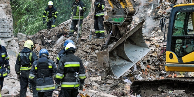 ZAPORIZHZHIA, UKRAINE - OCTOBER 11, 2022 - Rescuers eliminate the aftermath of a missile attack by Russian troops, Zaporizhzhia, southeastern Ukraine.