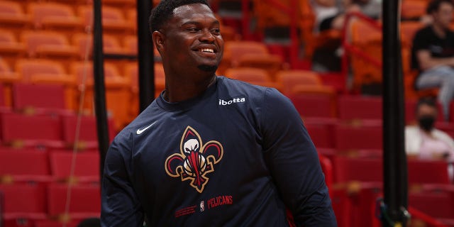 Zion Williamson, #1 of the New Orleans Pelicans, looks on during warm-ups before the preseason game against the Miami Heat on October 12, 2022, at FTX Arena in Miami, Florida.
