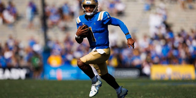 UCLA Bruins quarterback Dorian Thompson-Robinson, #1, runs with the ball during the college football game between the Utah Utes and the UCLA Bruins on Saturday, Oct. 8, 2022 at the Rose Bowl in Pasadena, California.