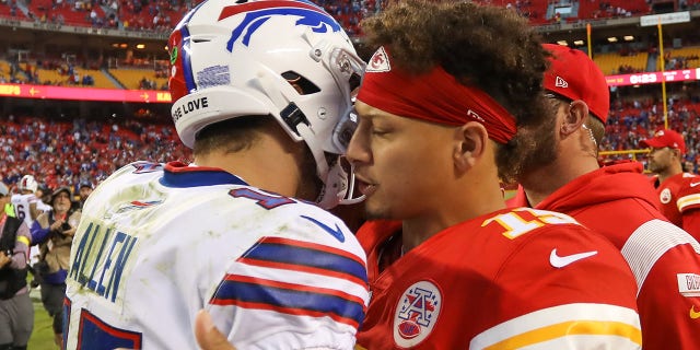 Kansas City Chiefs quarterback Patrick Mahomes, #15, and Buffalo Bills quarterback Josh Allen, #17, hug after an NFL game between the Buffalo Bills and Kansas City Chiefs on Oct. 16, 2022 at GEHA Field at Arrowhead Stadium in Kansas City, Missouri.