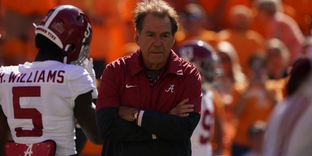 College football: Alabama head coach Nick Saban watches the Tennessee game during the game at Neyland Stadium. Knoxville, Tennessee.