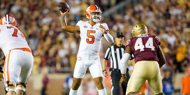 Clemson Tigers quarterback DJ Uiagalelei, #5, passes during the Clemson Tigers game against the Florida State Seminoles on Oct. 15, 2022, at Doak Campbell Stadium in Tallahassee, Florida.