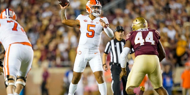 Clemson Tigers quarterback DJ Uiagalelei, #5, passes during the Clemson Tigers game against the Florida State Seminoles on Oct. 15, 2022, at Doak Campbell Stadium in Tallahassee, Florida.