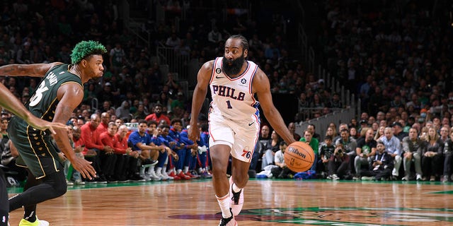 James Harden (1) of the Philadelphia 76ers drives to the basket during a game against the Boston Celtics Oct. 18, 2022, at TD Garden in Boston.    