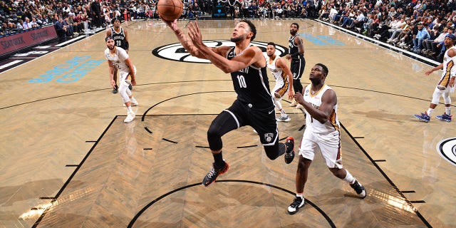 Ben Simmons, #10 of the Brooklyn Nets, shoots the ball during a game against the New Orleans Pelicans at Barclays Center on October 19, 2022 in Brooklyn, New York.