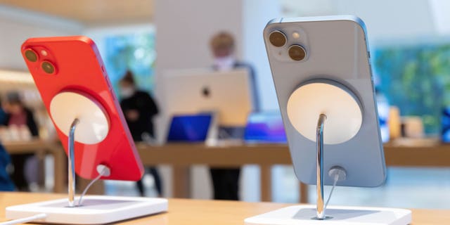 iPhone 14 on display inside Apple store in Marunouchi, Tokyo.