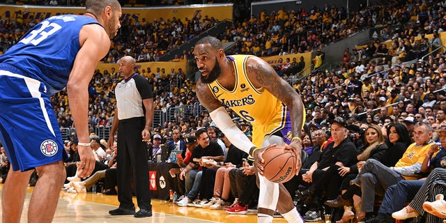 LeBron James, #6 of the Los Angeles Lakers, dribbles the ball during the game against the LA Clippers on Oct. 20, 2022 at Crypto.com Arena in Los Angeles.