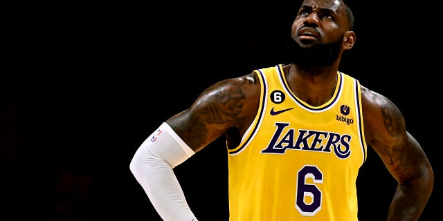 LeBron James, #6 of the Los Angeles Lakers, looks toward the video board against the LA Clippers in the first half of an NBA basketball game at the Crypto.com Arena in Los Angeles on Thursday, Oct. 20, 2022. 