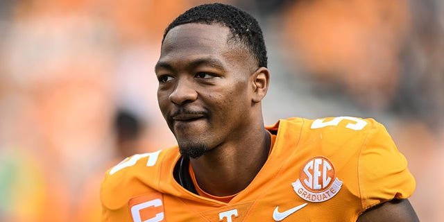 Tennessee Volunteers quarterback Hendon Hooker walks off the field after a game against the Tennessee-Martin Skyhawks Oct. 22, 2022, at Neyland Stadium in Knoxville, Tenn. 