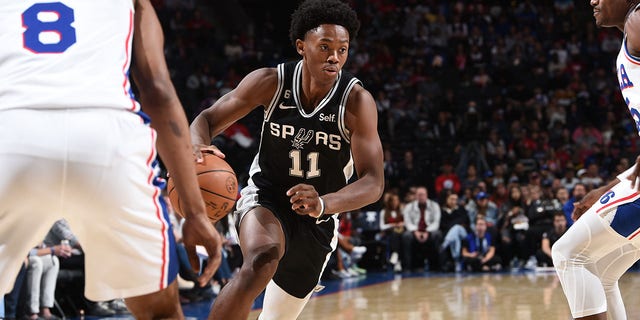 Joshua Primo #11 of the San Antonio Spurs drives to the basket during the game against the Philadelphia 76ers on October 22, 2022 at the Wells Fargo Center in Philadelphia, Pennsylvania