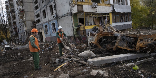 ZAPORIZHZHIA, UKRAINE - OCTOBER 25: Municipality workers clean up debris on October 25, 2022 in Zaporizhzhia, Ukraine. 