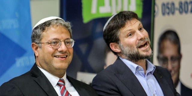 Itamar Ben-Gvir, left, and Bezalel Smotrich attend a rally with supporters in the southern Israeli city of Sderot on Oct. 26, 2022.