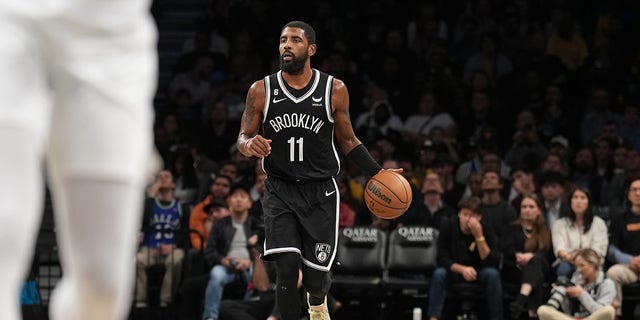 Kyrie Irving #11 of the Brooklyn Nets dribbles the ball during the game against the Dallas Mavericks on October 27, 2022 at Barclays Center in Brooklyn, New York. 