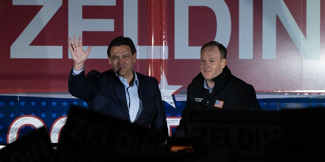 HAUPPAUGE, NY - OCTOBER 29: Florida Governor Ron DeSantis, left, next to New York's Republican Governor, Rep. Lee Zeldin, right, on October 29, 2022 in Hauppauge, New York. 
