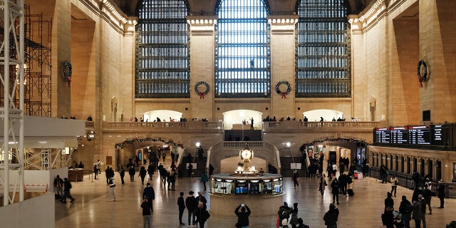 People walk through Grand Central Terminal on Dec. 23, 2020 in Manhattan.