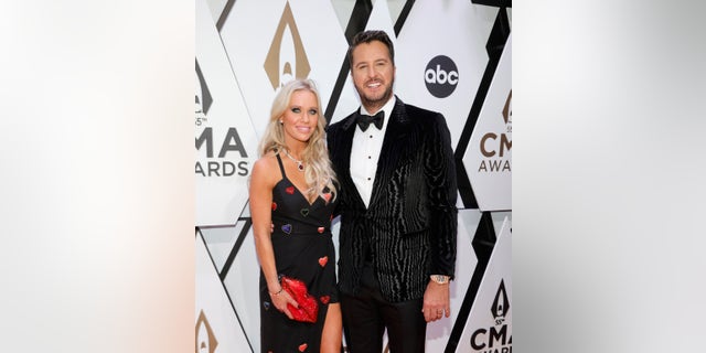Luke Bryan, who was joined by his wife Caroline at the CMA Awards in 2021, will also host this year alongside former NFL superstar Peyton Manning.