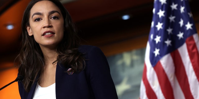 WASHINGTON, DC - DECEMBER 08: US Rep. Alexandria Ocasio-Cortez, D-NY, speaks during a news conference at the US Capitol December 8, 2021 in Washington, DC. 