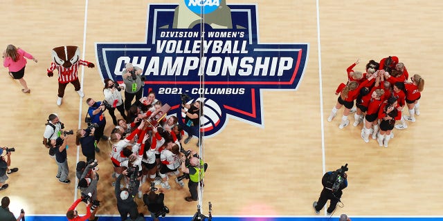 Wisconsin celebrates after defeating Nebraska during the Division I Women's Volleyball Championship on Dec. 18, 2021, in Columbus, Ohio.