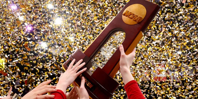 Wisconsin celebrates after defeating Nebraska during the Division I Women's Volleyball Championship on Dec.18, 2021, in Columbus, Ohio.