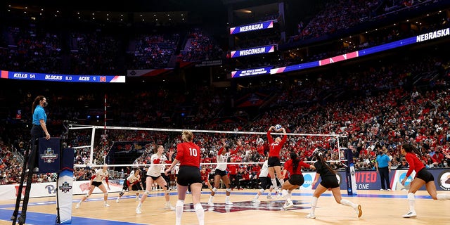 Nicklin Haymes #1 of the Nebraska Cornhuskers sets the ball against the Wisconsin Badgers during the Division I Women's Volleyball Championship on December 18, 2021 in Columbus, Ohio. 