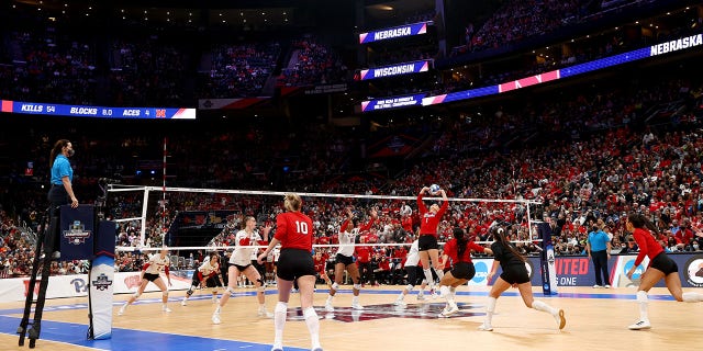 Nicklin Hames #1 of the Nebraska Cornhuskers sets the ball against the Wisconsin Badgers during the Division I Women's Volleyball Championship on Dec. 18, 2021, in Columbus, Ohio.