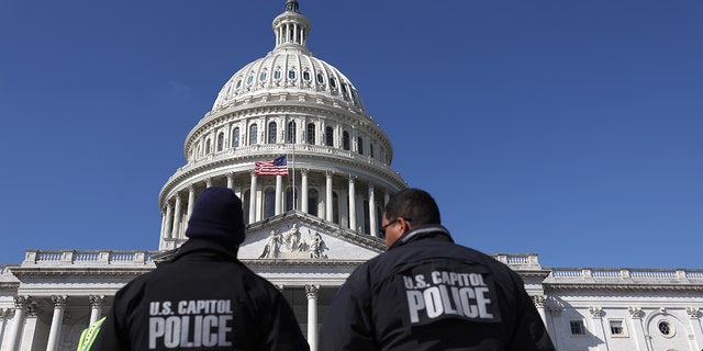 U.S. Capitol police officers gather on the east front plaza of the Capitol on February 28, 2022, in Washington, DC. 