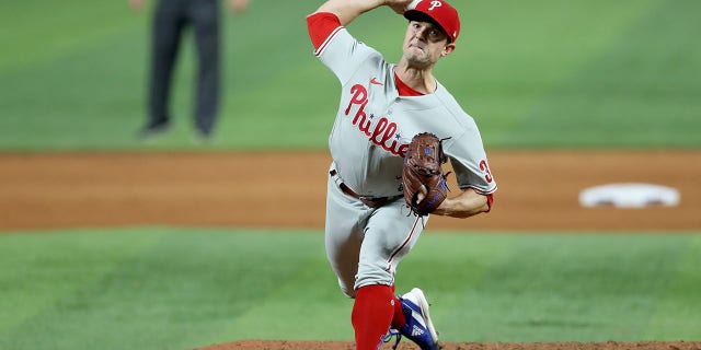 David Robertson #30 of the Philadelphia Phillies deliver a pitch against the Miami Marlins at loanDepot park on September 13, 2022 in Miami, Florida. 