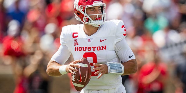 Quarterback Clayton Tune #3 of the Houston Cougars looks to pass during the first half of the game against the Texas Tech Red Raiders at Jones AT&amp;amp;T Stadium on September 10, 2022, in Lubbock, Texas. 