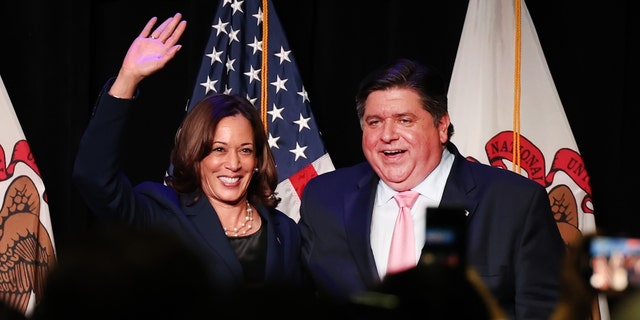 The law, which Democrat Gov.  JB Pritzker of Illinois, right, signed last year, includes numerous provisions that proponents say will improve public safety in the state and make that criminal justice system more equitable.