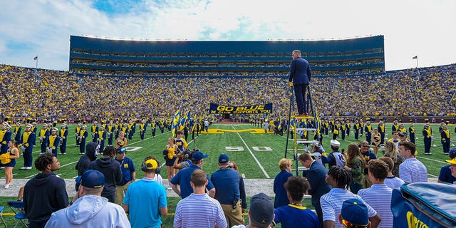 View of the Michigan Marching Band performing on the field before a game between the Michigan Wolverines and Connecticut Huskies at Michigan Stadium Sept. 17, 2022, in Ann Arbor, Mich. 