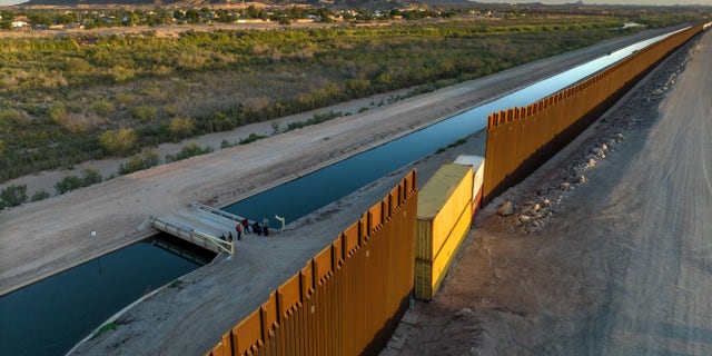 Several gaps in the border fence built by the Trump administration were recently filled by the Arizona government with shipping containers, making it more difficult for immigrants to cross certain areas. 