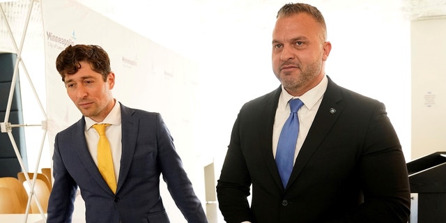 Minneapolis Mayor Jacob Frey, left, and his nominee for Minneapolis Police Department police chief Brian O'Hara, currently the deputy mayor of Newark, New Jersey, walk off after a press conference.