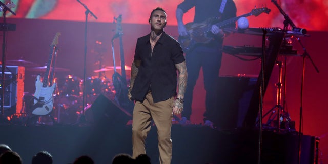 Adam Levine and his band Maroon 5 perform "it's love" At Shaq's charity event.
