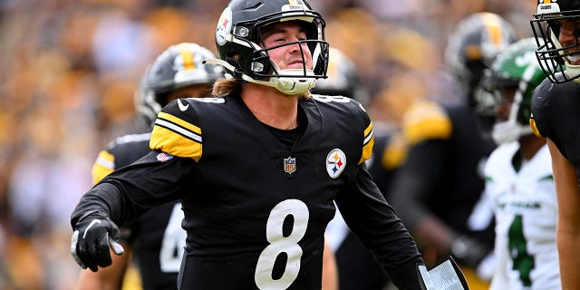 Kenny Pickett, #8 of the Pittsburgh Steelers, celebrates after scoring a touchdown in the third quarter against the New York Jets at Acrisure Stadium on Oct. 2, 2022 in Pittsburgh.