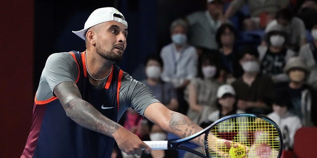 Nick Kyrgios of Australia in action during his match against Chun-Hsin Tseng of Taipei on day two of the Rakuten Japan Open at Ariake Coliseum on October 04, 2022 in Tokyo, Japan. 