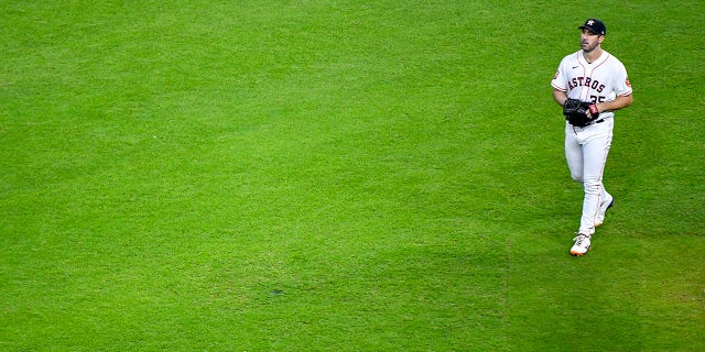 Justin Verlander, #35 of the Houston Astros, walks around the pitching mound in the sixth inning against the Philadelphia Phillies at Minute Maid Park on Oct. 4, 2022 in Houston.