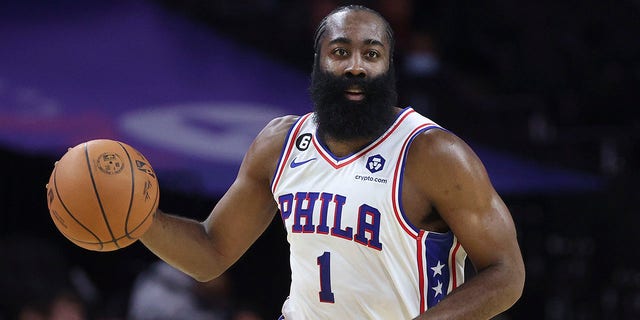 James Harden of the Philadelphia 76ers dribbles during the first quarter against the Cleveland Cavaliers at the Wells Fargo Center in Philadelphia on Oct. 5, 2022. 