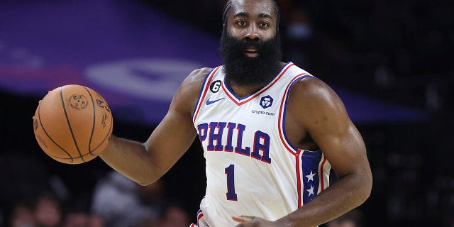 James Harden of the Philadelphia 76ers dribbles during the first quarter against the Cleveland Cavaliers at the Wells Fargo Center in Philadelphia on Oct. 5, 2022. 