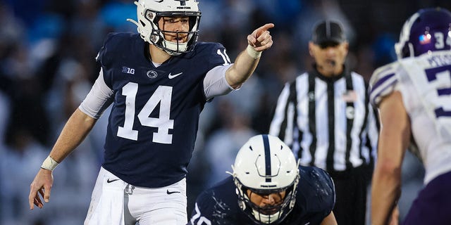 Sean Clifford of the Penn State Nittany Lions signals to teammates before a play against the Northwestern Wildcats during the second half at Beaver Stadium Oct. 1, 2022, in State College, Pa. 